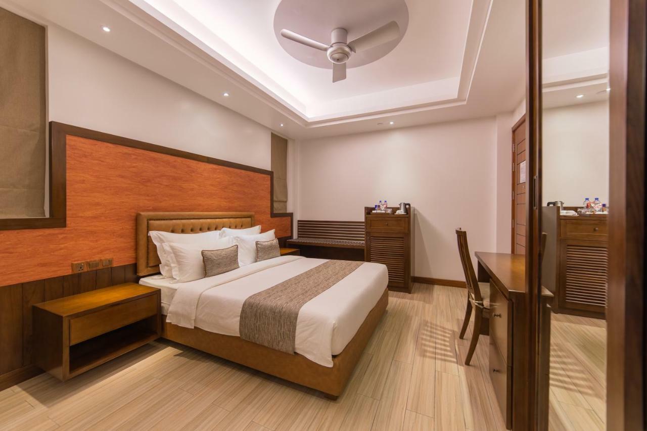 ซามันน์ โฮสต์ Hotel ฮุลฮูมาเล ภายนอก รูปภาพ