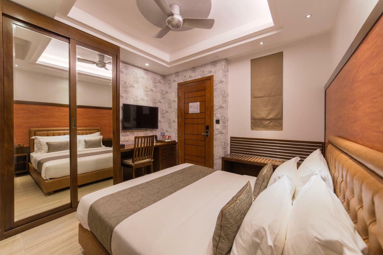 ซามันน์ โฮสต์ Hotel ฮุลฮูมาเล ภายนอก รูปภาพ